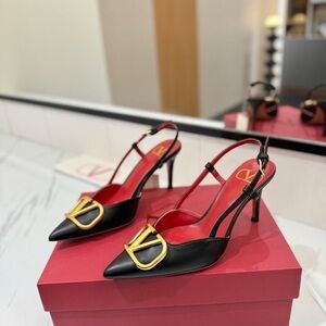 Valentino Black and Gold Heels with Red Accents